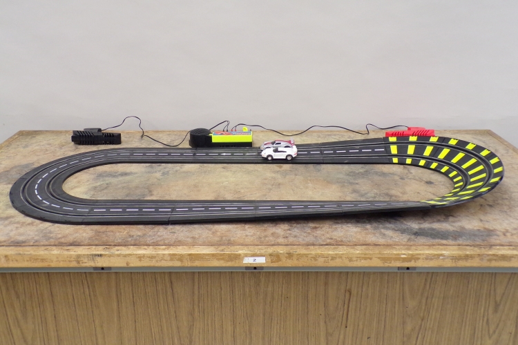 16-36-toy-cars-on-banked-curve